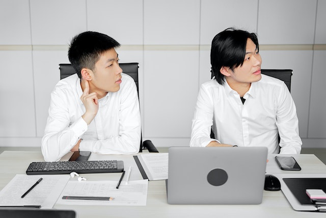 Two young business man in a meeting